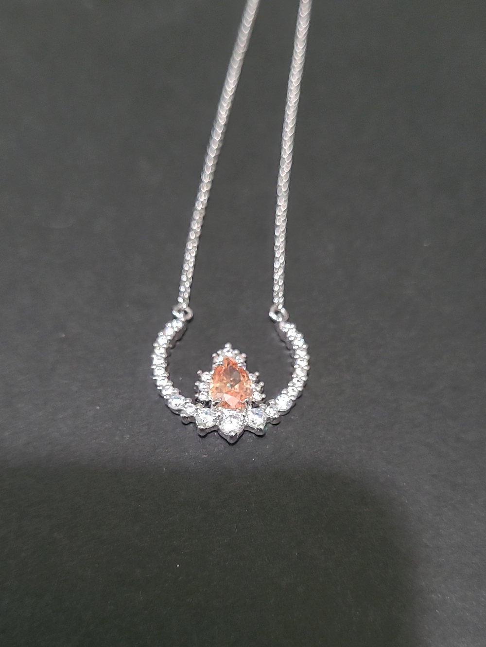 Silver Necklace with Peach Teardrop Stone and Clear Accents